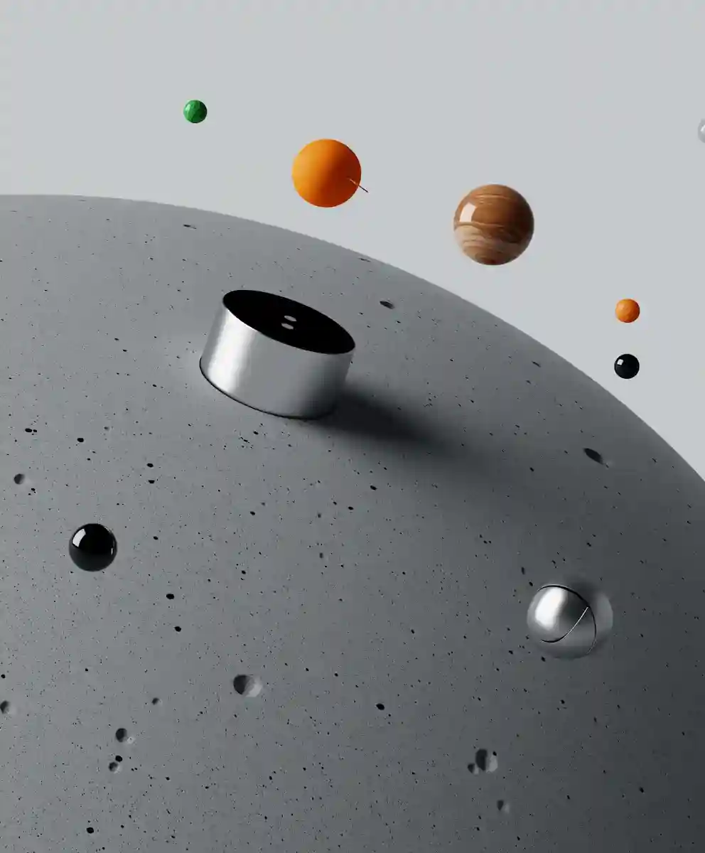 3D digital art of a large gray cratered sphere with various smaller colored spheres floating above it against a light gray background.